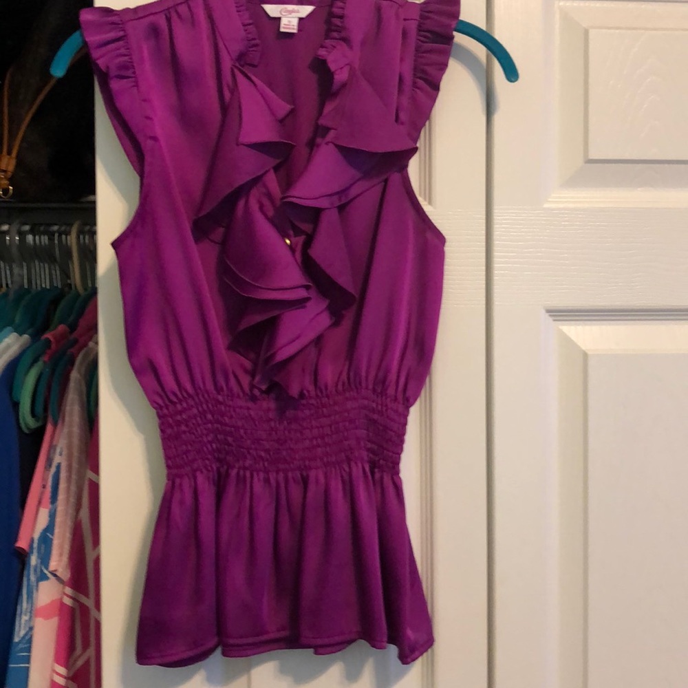 Stunning plum peplum ruffle top